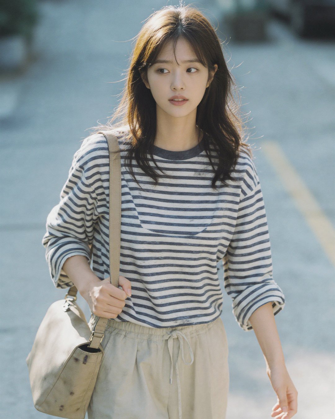 SEOA wearing a striped shirt outdoors